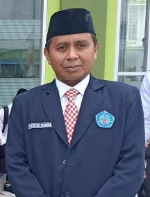 Reyther Biki, SE, M.Si